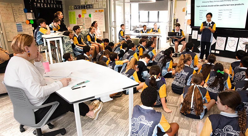Students debating in the classroom at Our Lady of The Rosary Primary School Kellyville