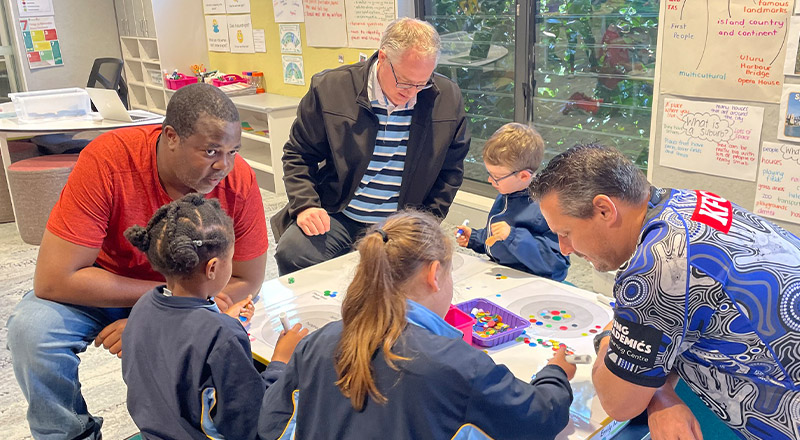 Students with their parents in the classroom during a school event at Our Lady of The Rosary Primary School Kellyville
