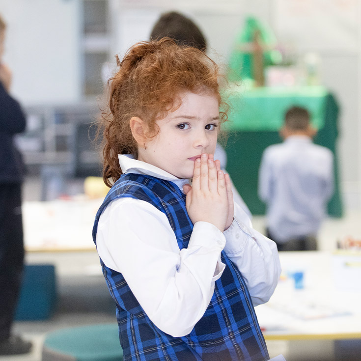 Student praying the Angelus in class at Our Lady of The Rosary Primary School Kellyville